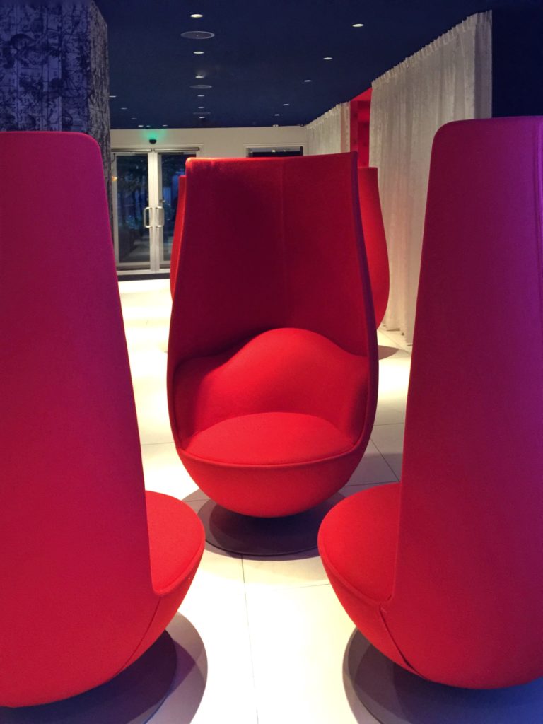 Whimsical red tulip chairs designed by Marcel Wanders for the Andaz hotel in Amsterdam.