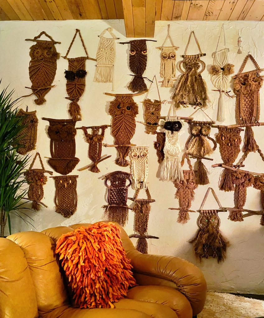 Bohemian gallery art wall with series of woven macrame owls at the Parker Palm Springs Hotel.