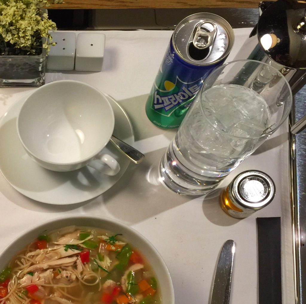 Korean chicken noodle soup on room service tray