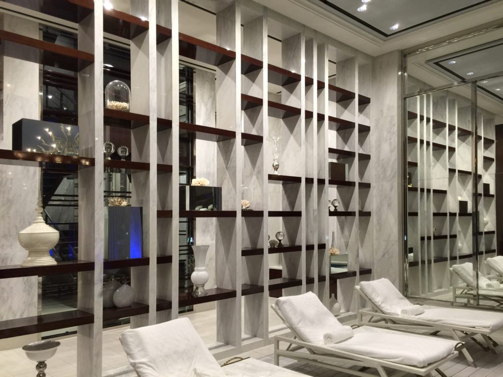 White shelving screen wall with decorative accessories in the spa at the JW Dongdaemun hotel in Seoul.
