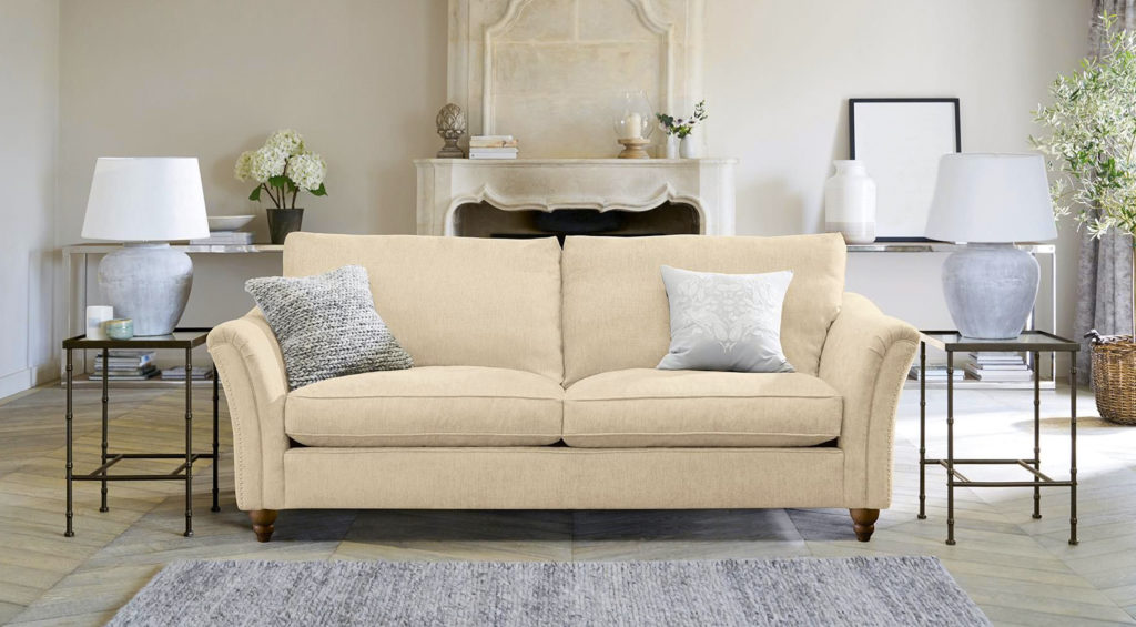 Decorating myths - always match your furniture. Neutral interior design living room with matching, beige furniture set.