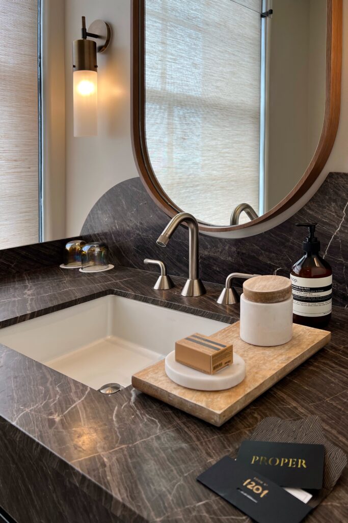 Luxury hotel in dowtown Los Angeles - Guest room bathroom vanity marble top.