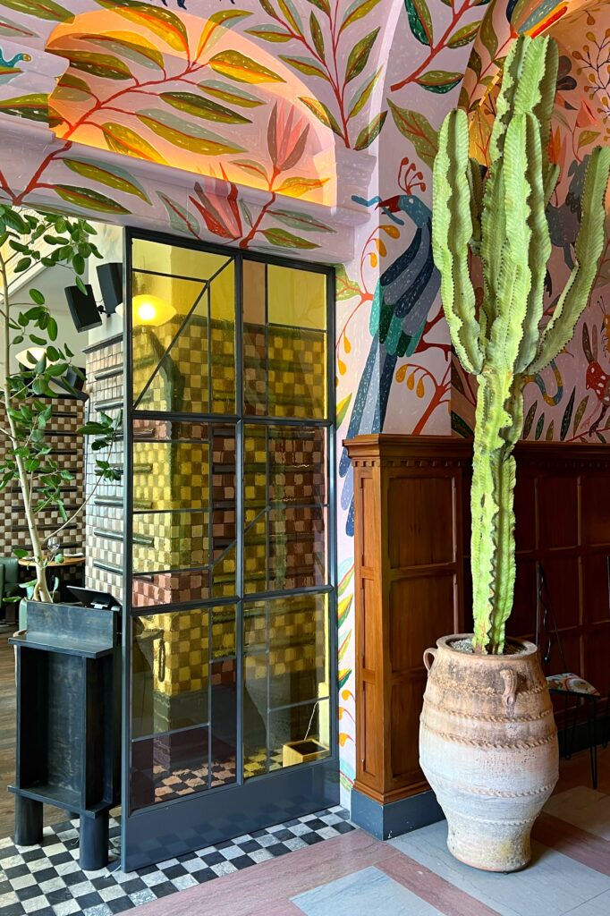 Luxury hotel in dowtown Los Angeles - Stained glass and cactus at the Proper Hotel.