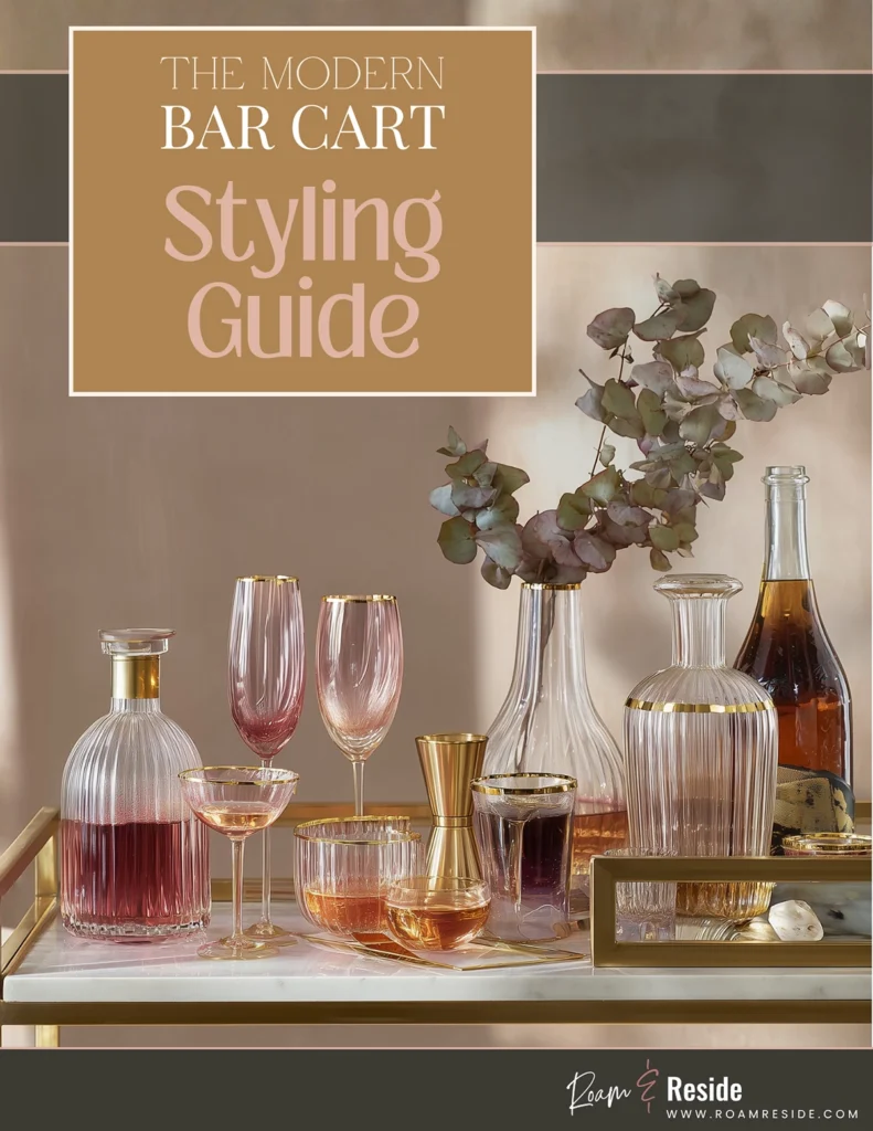 Image of a beautiful modern luxe bar cart with decanters and marble and brass details. This is the cover page for the Roam and Reside Bar Car Styling Guide