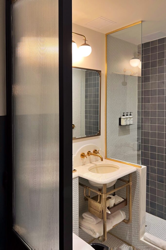 The bathroom sink vanity inside the guest room of the Civilian Hotel, one of New York City's most aesthetic spaces.