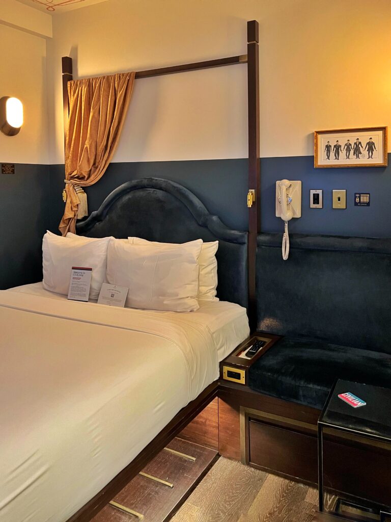 The draped headboard above the bed inside the guest room at the Civilian Hotel, one of New York City's most aesthetic spaces.