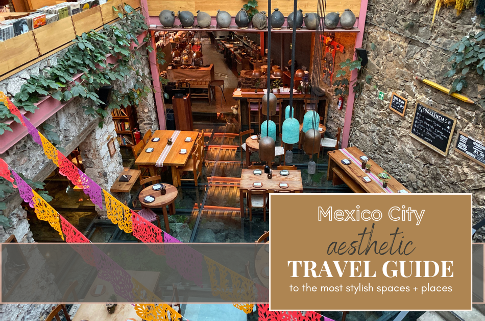 Interior view of Tetetlán café in Mexico City, featuring rustic stone walls, wood furniture, colorful papel picado, and modern architectural lighting. A must-visit spot for design lovers featured in the Mexico City Aesthetic Travel Guide.